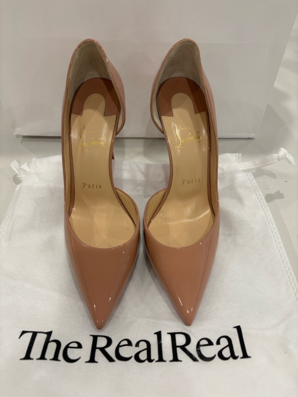 CHRISTIAN LOUBOUTIN PATENT LEATHER IRIZA NUDE PUMPS- 38.5
SOLD OUT